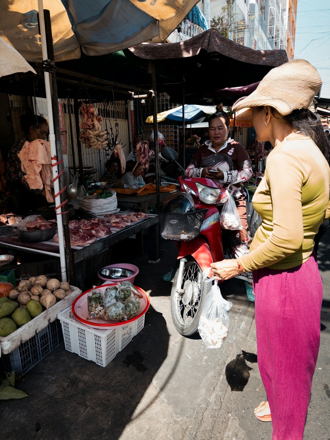 woman at market stall